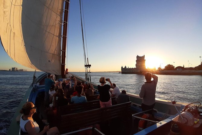 2-Hour Lisbon Traditional Boats Sunset Cruise with White Wine - Alfama and Lisbon Cathedral from the water