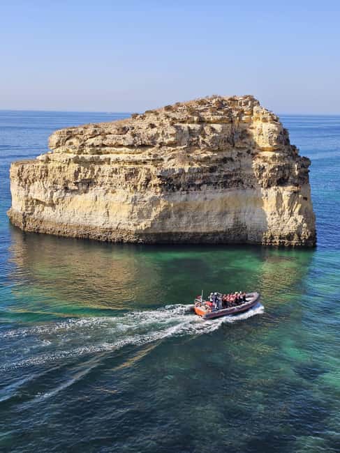 Albufeira: Dolphin Watching and Benagil Cave Boat Cruise - Alfanzina Lighthouse and the refreshing swim stop