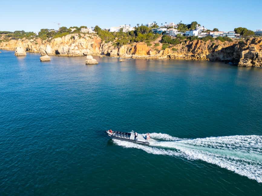 Albufeira: Dolphins, Benagil Caves and Coastline Boat Tour - The Algarve coastline from a low seat