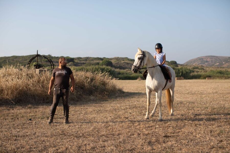 Algarve: 1-Hour Carrapateira Horseback Riding Tour - The return through plants and village scenery
