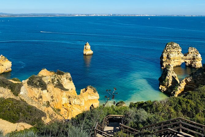 Algarve: Lagos sightseeing guided tour with E-bikes - Praia do Canavial adds the rougher side of the coast