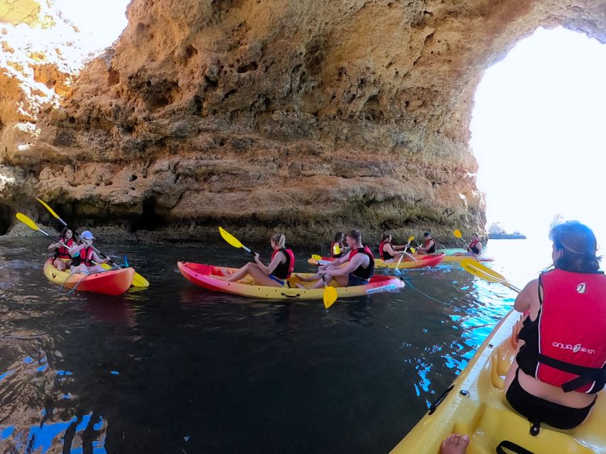 Alvor: Explore Caves Boat and Kayak Tour - Swimming from Frontino in a scenic coastal stop
