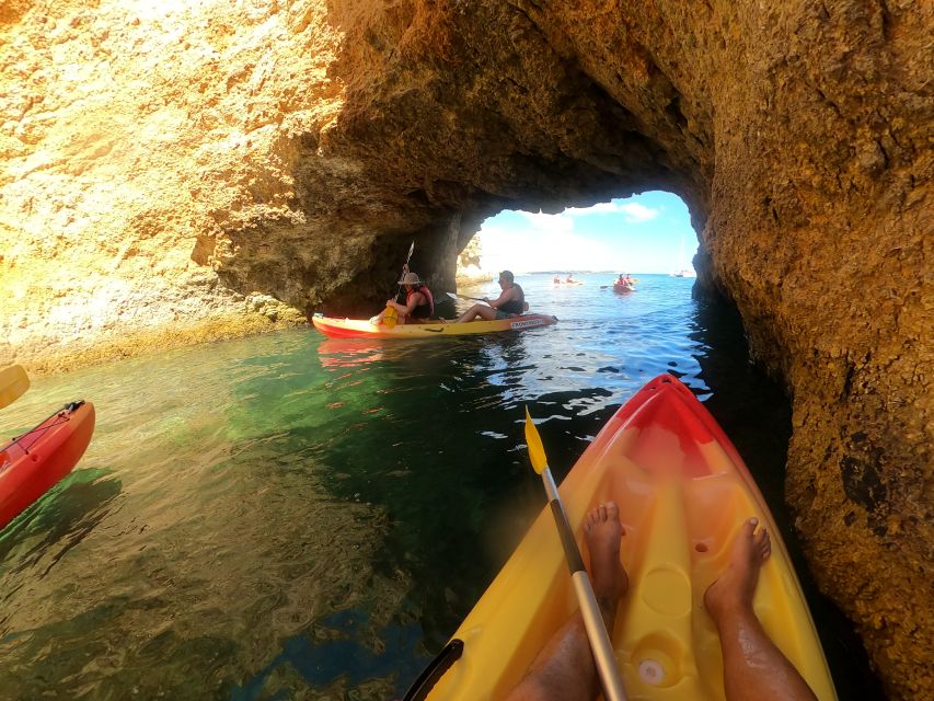 Alvor: Explore Caves Boat and Kayak Tour - The first hour: cruising from Alvor toward Praia do Vau