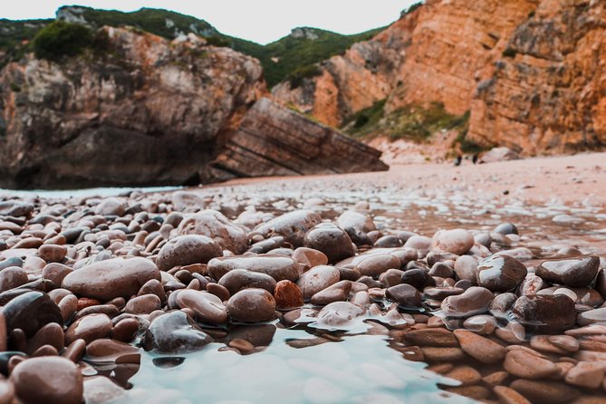 Arrábida Secret Beaches and Caves with Snorkeling Stop - Cabo Espichel by boat, with caves and lighthouse views