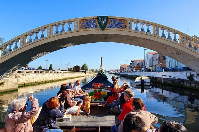 Aveiro and Costa Nova: Private Tour with Moliceiro Cruise Half Day - Costa Nova and its striped wooden cottages