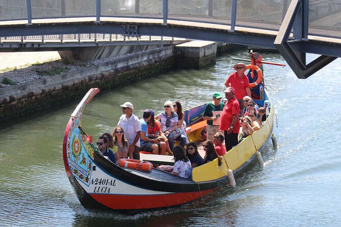Aveiro Canal Cruise in Traditional Moliceiro Boat - Boat comfort, seating, and engine noise
