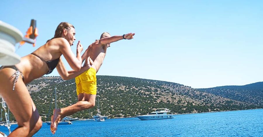 Boat Party to the Beach with Swimming Stops, DJ and Open Bar - How the $41 price measures up