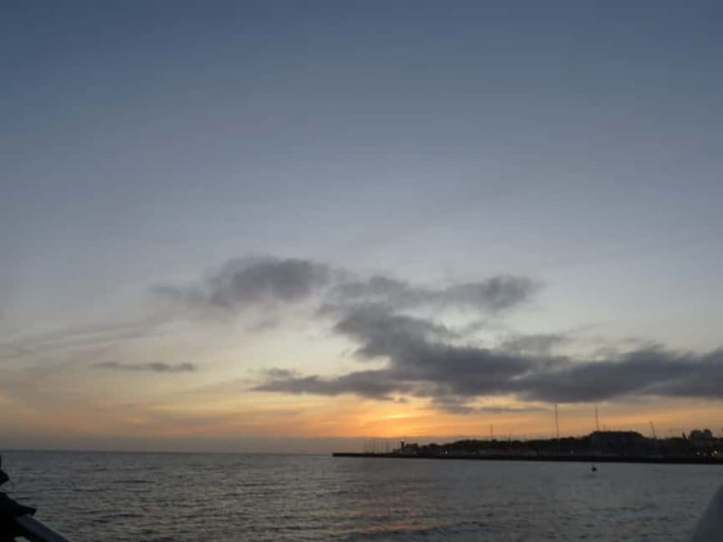 Cascais: Sunset Boat Trip with Welcome Drinks - The cruise past Cascais villas and fortifications