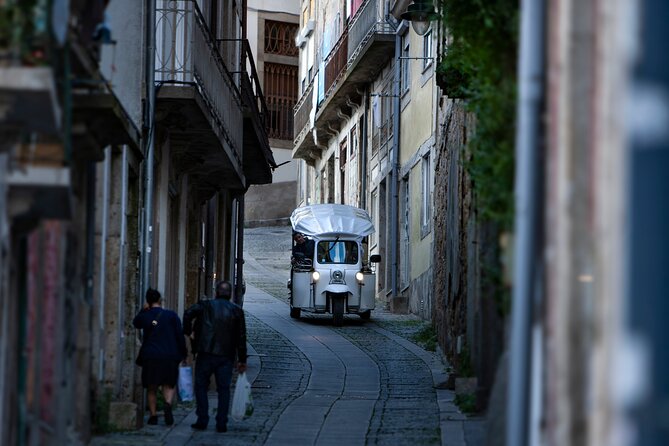 Discover Porto's Highlights on a 2-Hour Private Electric Tuk Tuk - Cordoaria, Clérigos, and the city’s classic skyline