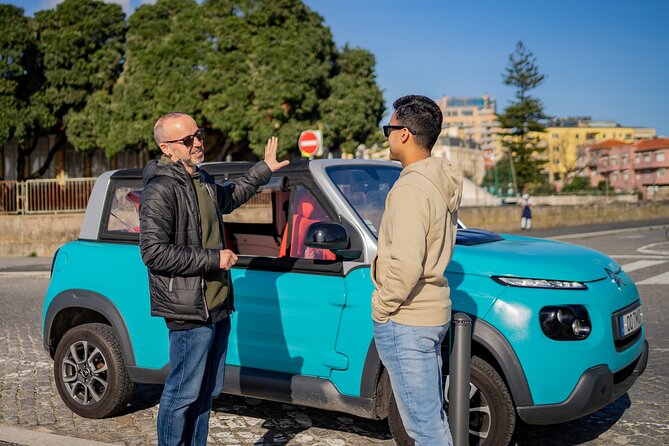 Discovering Porto in an eco-friendly vehicle - A glass of Port wine adds a local finish