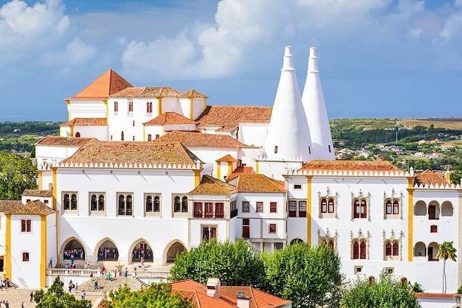 Exclusive Private Tour to Sintra, Pena Palace & Cascais - The National Palace and optional Quinta da Regaleira