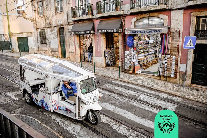 Expert Lisbon Tour with Local Guide in Private Eco Tuk Tuk - Chiado and Bairro Alto show two sides of central Lisbon