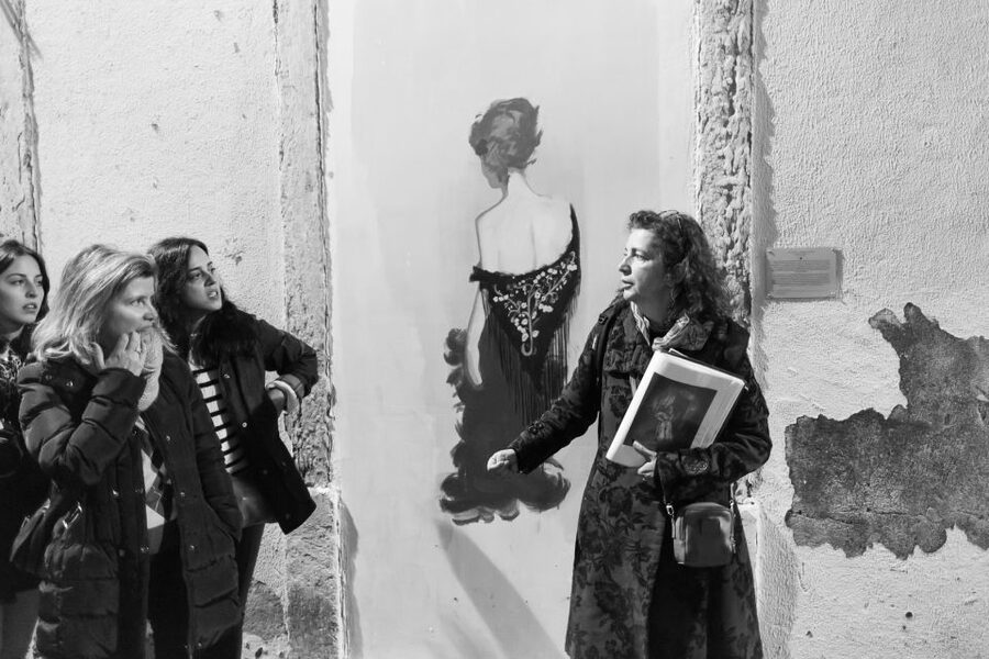 Fado: Musical Walking Tour with Food & Live Show - Walking through Praça Martim Moniz and Mouraria
