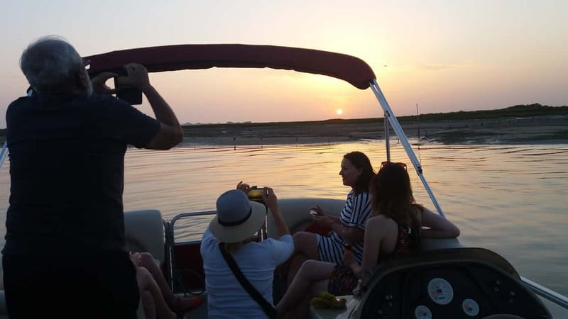 Faro: Sunset 1 hour Ria Formosa Boat Tour - The island and beach stop