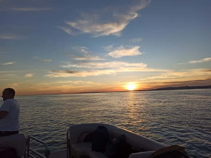 Faro: Sunset 1 hour Ria Formosa Boat Tour - Meeting the boat near Eva Senses Hotel