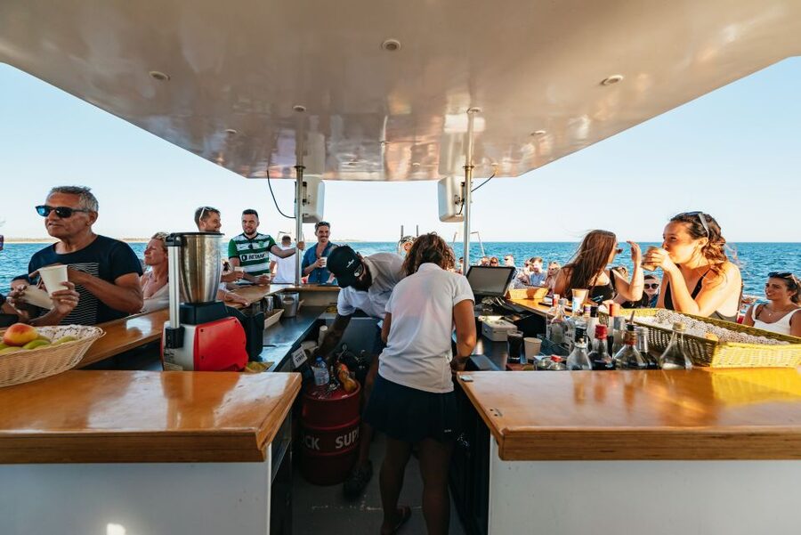 From Albufeira: Sunset Cruise and Beach BBQ with Open Bar - Music, fire performance, and the ride home
