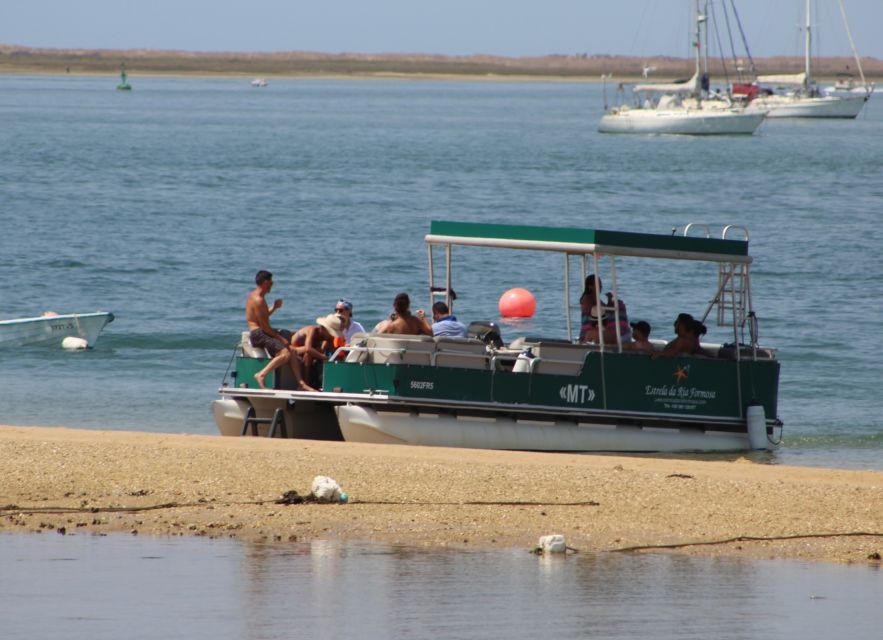 From Faro: 2-Island, 2-Stop Ria Formosa Catamaran Tour - Farol Island and its lighthouse
