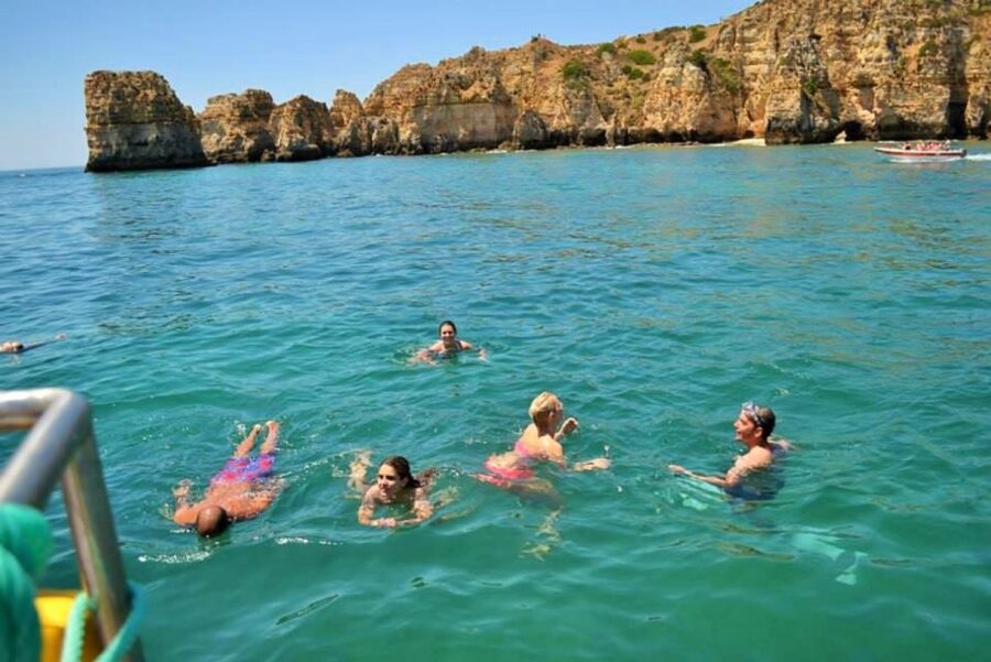From Lagos: 2.5-Hour Guided Coastal Boat Tour & Grotto Visit - Swimming, Sun, and the Aqua Trampoline