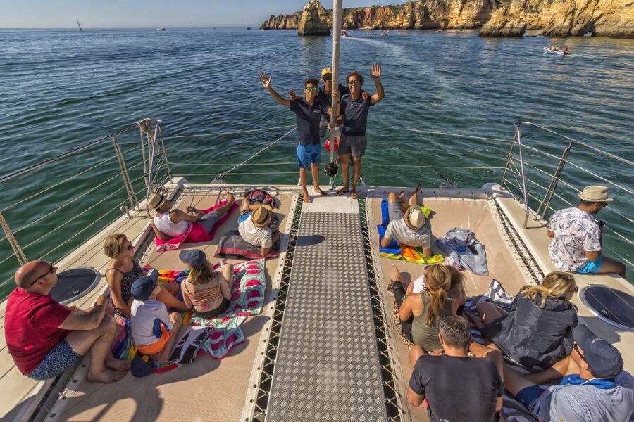 From Lagos: Algarve Cruise by Catamaran - The swim stop and inflatable water park