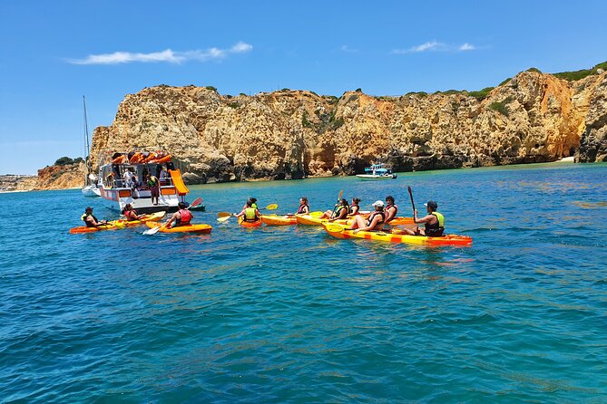 From Lagos: Kayak Tour of Ponta da Piedade Caves on Catamaran - Swimming, the slide, and the ride back
