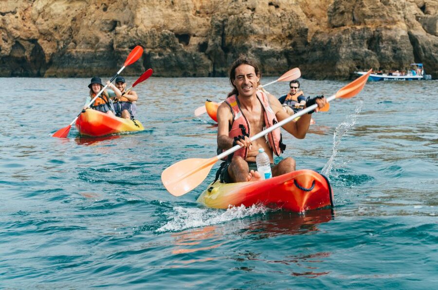 From Lagos: Kayaking and Boat Cave Explorer Tour - Swimming from the support boat