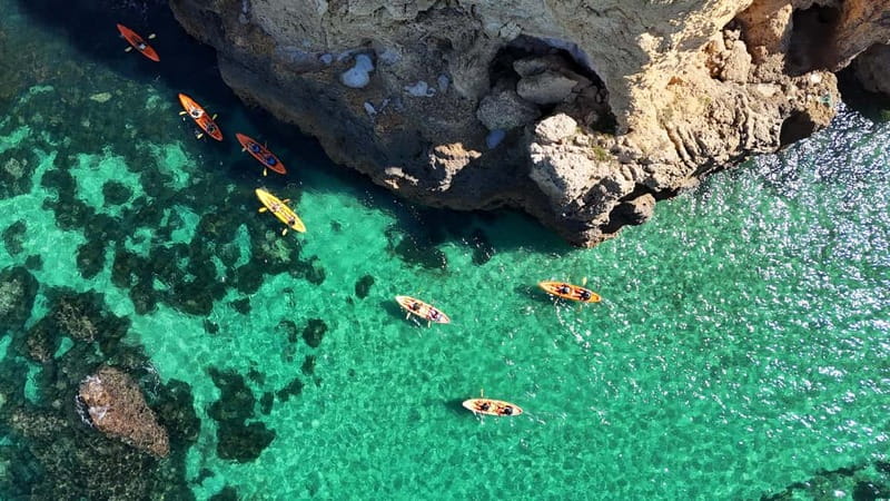 From Lagos: Ponta da Piedade Caves Kayak Tour from Catamaran - From Passeio dos Descobrimentos to Lagos Marina