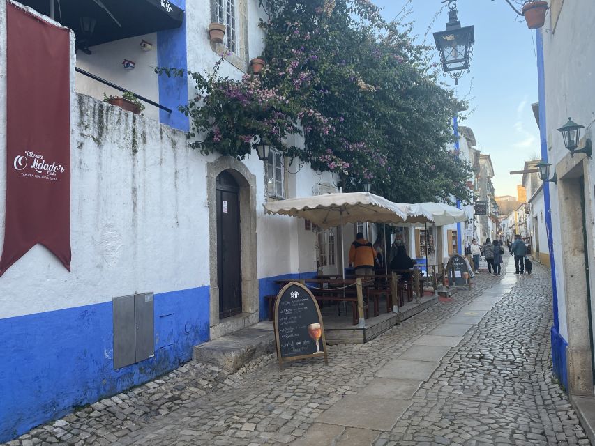 From Lisbon: Fátima, Batalha, Nazaré, and Obidos Tour by Van - Nazaré: Atlantic air and giant-wave country