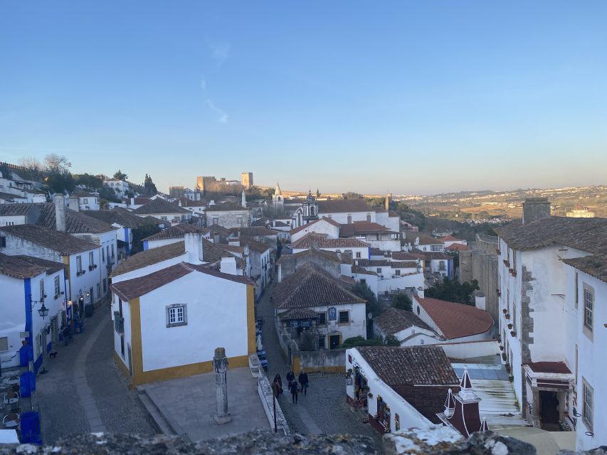 From Lisbon: Fátima, Batalha, Nazaré, and Obidos Tour by Van - Óbidos: cobbled lanes and cherry liquor