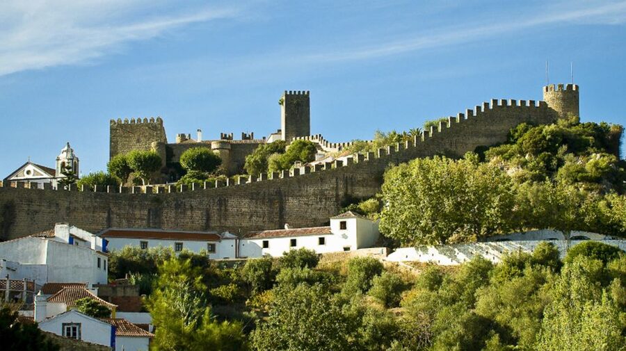 From Lisbon: Fátima, Batalha, Nazaré & Óbidos Full-Day Tour - Nazaré, fishing traditions, and giant Atlantic waves