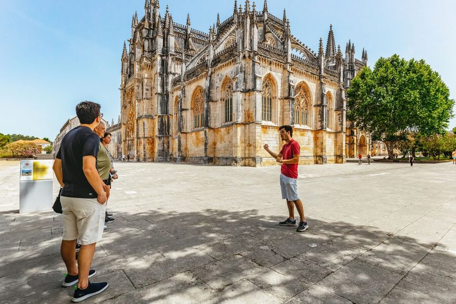 From Lisbon: Fatima Batalha Nazaré & Óbidos Small-Group Tour - Batalha Monastery and its Gothic stonework