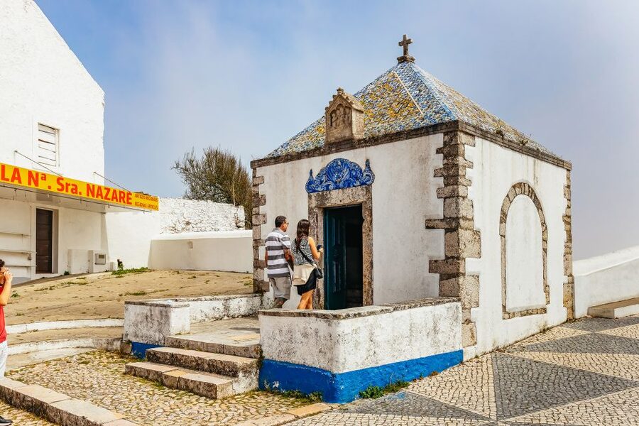 From Lisbon: Fatima Batalha Nazaré & Óbidos Small-Group Tour - Nazaré, the lighthouse, and the Atlantic
