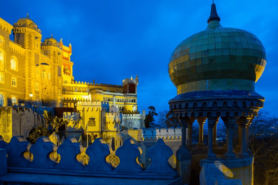 From Lisbon: Pena Palace, Regaleira, Sintra & Cascais Tour - Pena Palace: colorful towers above the Sintra hills