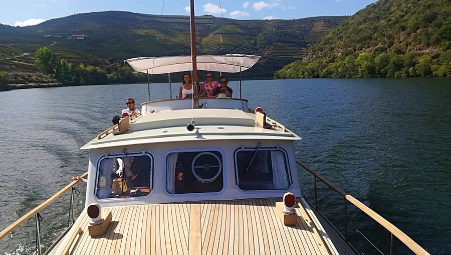From Pinhão: Private Yacht Cruise along the Douro River - The yacht, lounge, roof, and deck