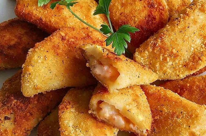 Half-Day Walking Tour Tasting Local Food in Porto - Bolhão Market: Porto’s food center