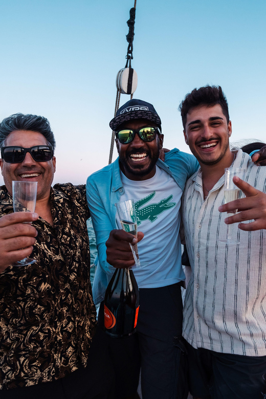 Lagos: Sunset Sail aboard a Traditional Boat with Prosecco - Along the Golden Coast and grotto shore