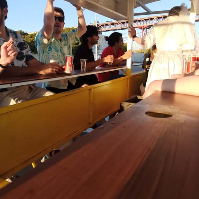 Lisbon: 1-Hour Beer or Sangria Bike Sightseeing Tour - A moving bar beside the Tejo