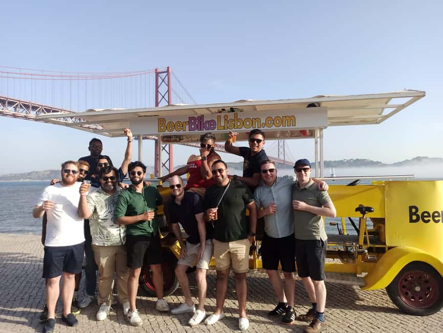 Lisbon: 1-Hour Beer or Sangria Bike Sightseeing Tour - The 25 de Abril Bridge makes the strongest photo stop