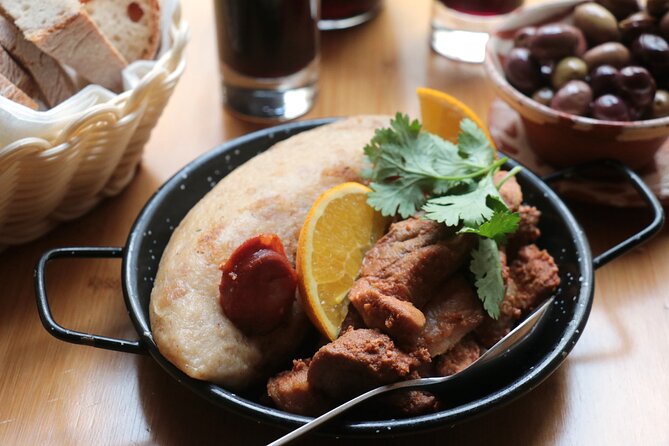 Lisbon 4 Foodies Tour - From Street Food to Awarded Chefs’ Portuguese Delicacies - Crossing Praça Luís de Camões into Bairro Alto