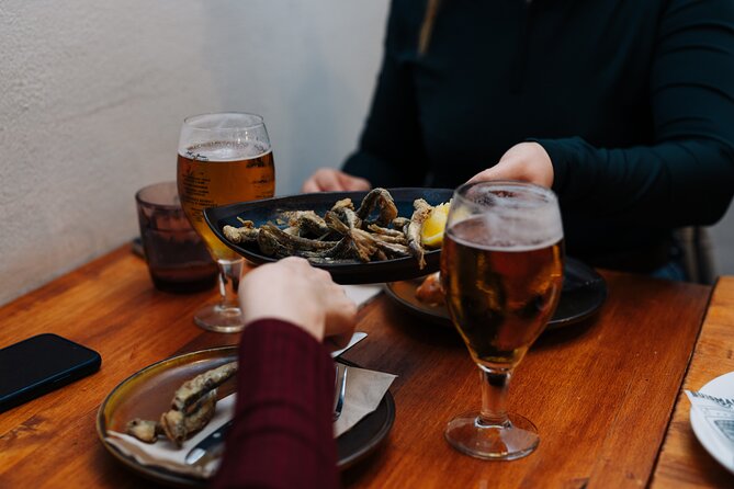 Lisbon: Award-Winning Guided Walking Food Tour with Local Drinks - Restauradores Square and the final pastel de nata