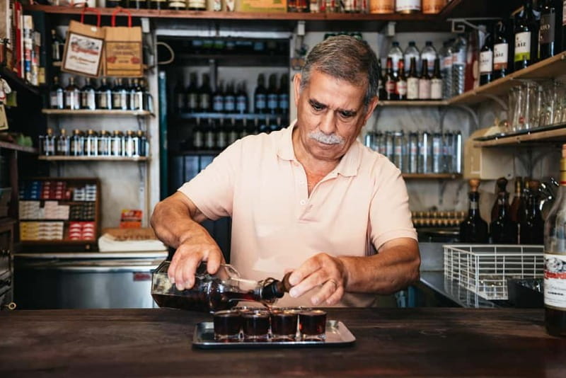 Lisbon: Baixa District Food Tour with Dinner and Drinks - Four drinks, from vinho verde to ginjinha