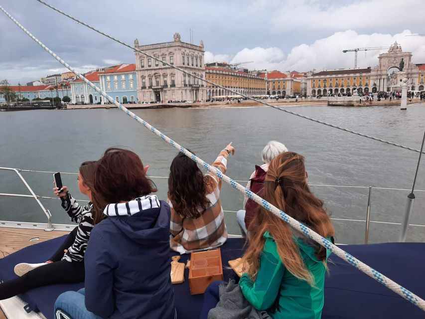 Lisbon: City Skyline Sailboat Cruise with Drink and Snacks - Under the 25 de Abril Bridge toward Belém