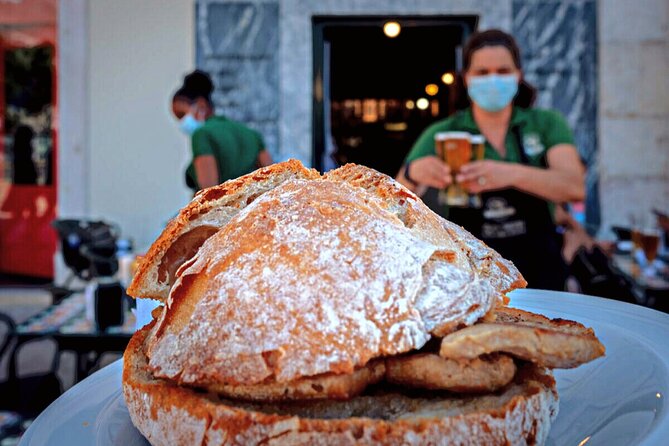 Lisbon Cultural Food and Wine Walking Tour - Fourteen Portuguese tastes, from savory to sweet