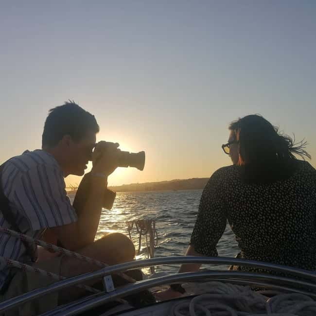 Lisbon: Daytime or Sunset Boat Cruise with History and Wine - Under the 25 de Abril Bridge