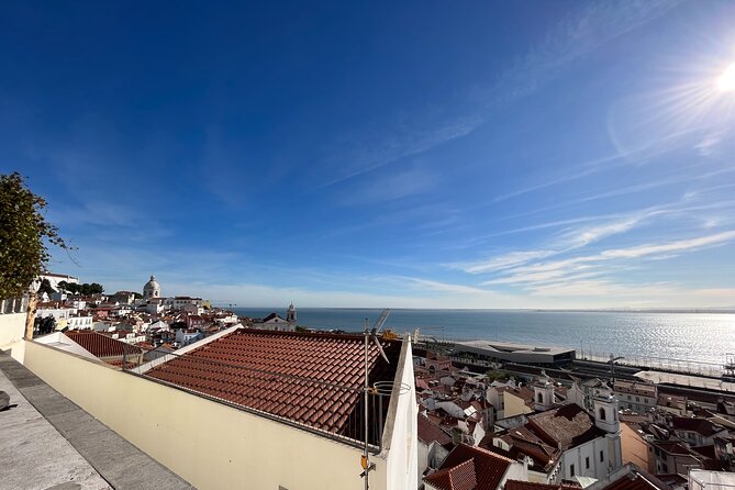 Lisbon Downtown & Alfama with a guide Walking tour - Beneath the Augusta Street Arch