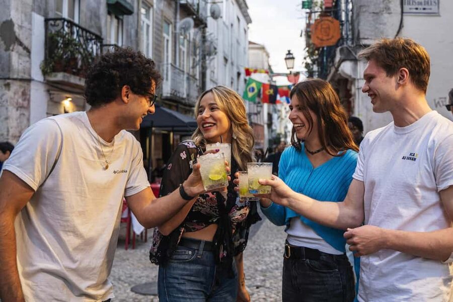 Lisbon: Drunken History Walking Tour with Included Drinks - Walking through Bairro Alto