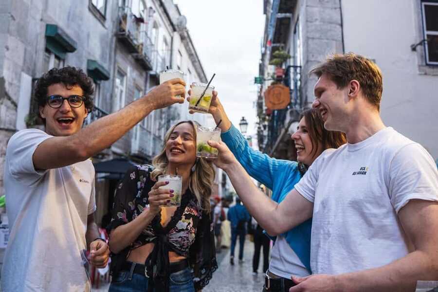 Lisbon: Drunken History Walking Tour with Included Drinks - Guides who shape the night