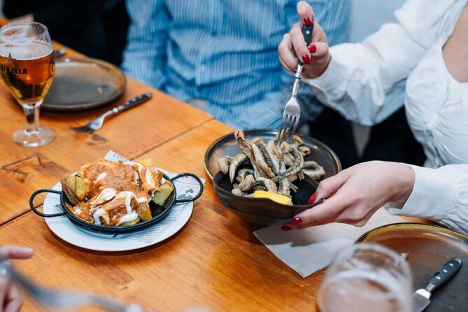Lisbon Food Tour with Portuguese Wine: Taste the Best of Portugal - Stop one: petiscos on Rua dos Fanqueiros