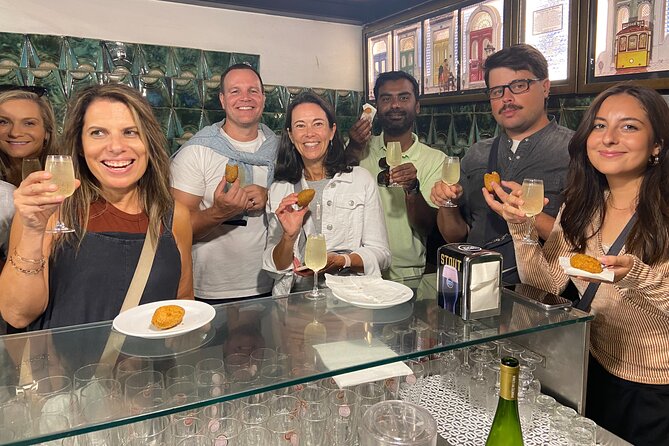 Lisbon Foodies Small-Group Walking Tour - Rua das Portas de Santo Antão and tavern food