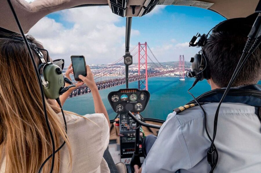 Lisbon: Helicopter Ride, Boat Trip, & Old Town Walking Tour - Cruising from Praça do Comércio to Belém