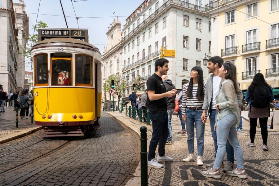 Lisbon: Helicopter Ride, Boat Trip, & Old Town Walking Tour - Returning to central Lisbon